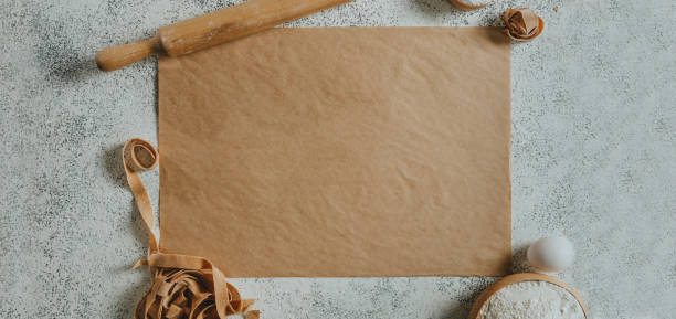 istock Paper with copy space near handmade pasta, rolling pin, flour and eggs 1481466070