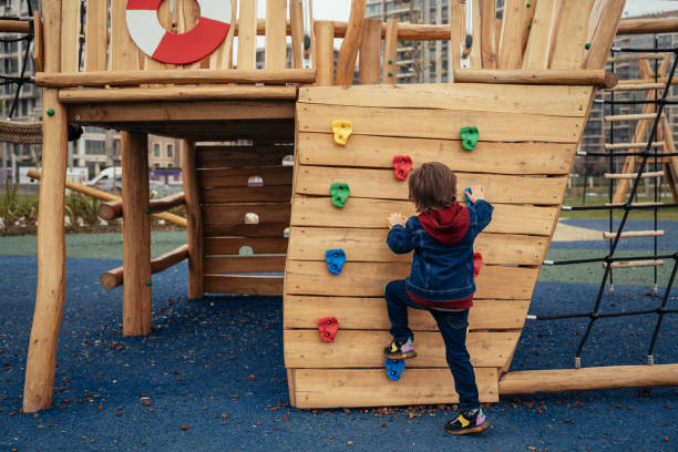 istock Little boy climbing on the playground 1481466480