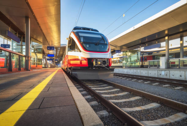 istock High speed train on the modern railway station at sunset 1481468754