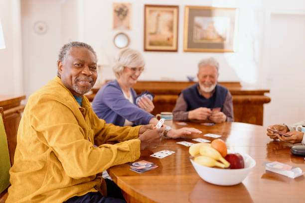 istock Close-up of a senior man playing cards 1481477408