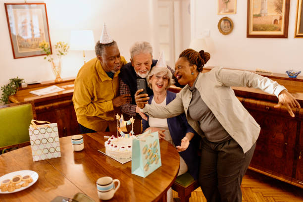 istock Senior people taking a selfie during a birthday party 1481480236