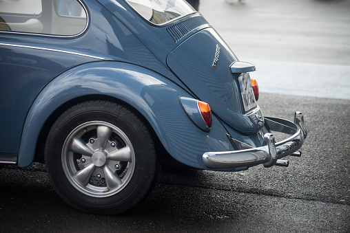 Mulhouse - France - 12 March 2023 - Rear view of blue old Volkswagen beetle parked in the street