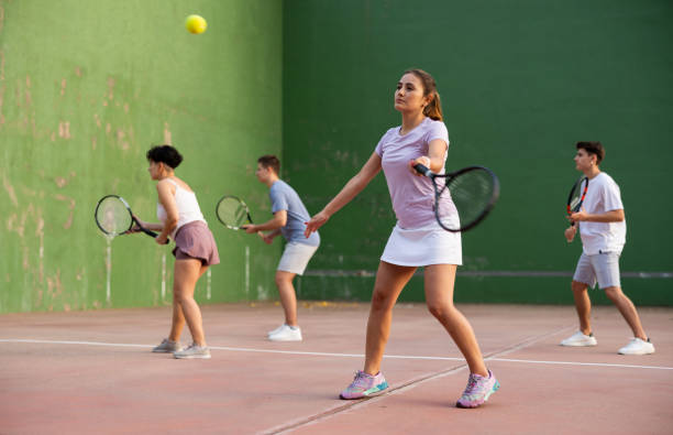 istock Woman serving ball during frontenis game outdoors 1481493037