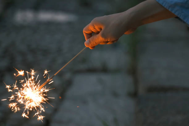 istock People enjoying handheld fireworks in summer 1481495658