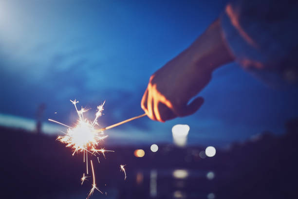 istock People enjoying handheld fireworks in summer 1481495733