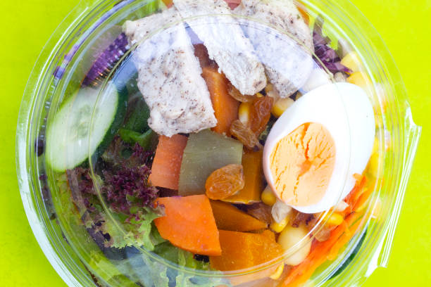 istock Salad with meat and vegetables in plastic package box 1481497278