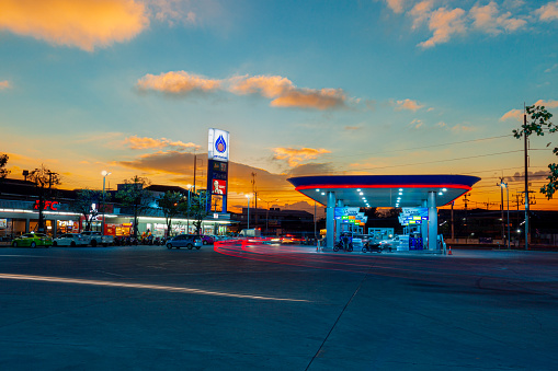 Samut Sakhon, Thailand, January 23, 2022:View of PTT gas station at night, Ratchaburi Thailand. Select focus.