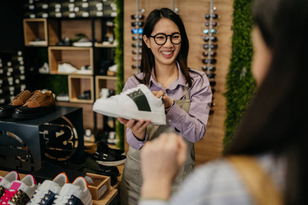 istock Women working in a shoe store 1481501663