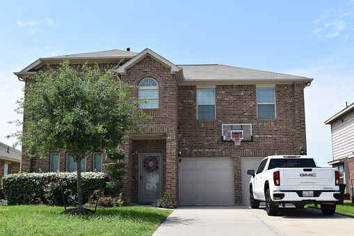 04-02-2023, Houston, TX - A luxurious home and driveway.