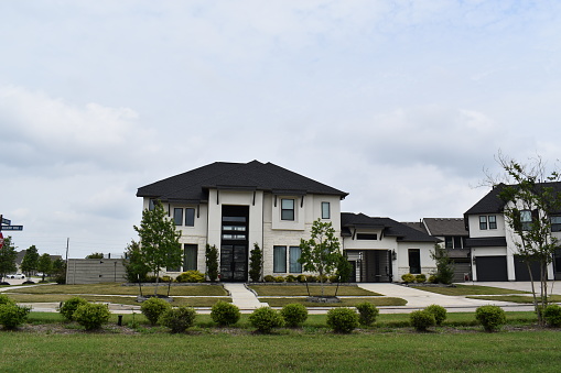 04-02-2023, Houston, TX - A luxurious home and driveway.