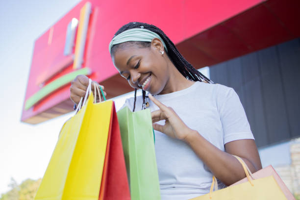 istock Young woman coming back from shopping 1481511951