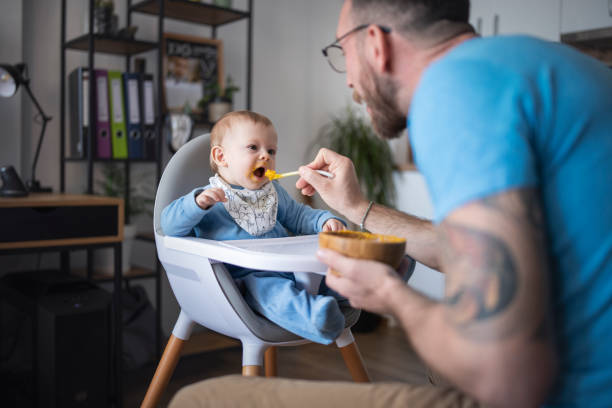 istock Cute baby boy enjoying his delicious lunch. 1481512689