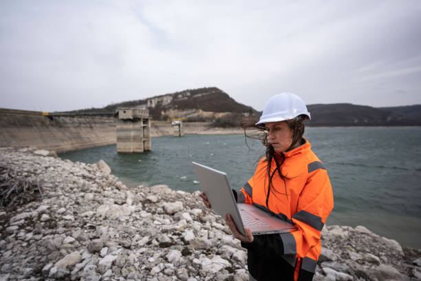 istock Female engineer working in hydroelectric dam. 1481512748