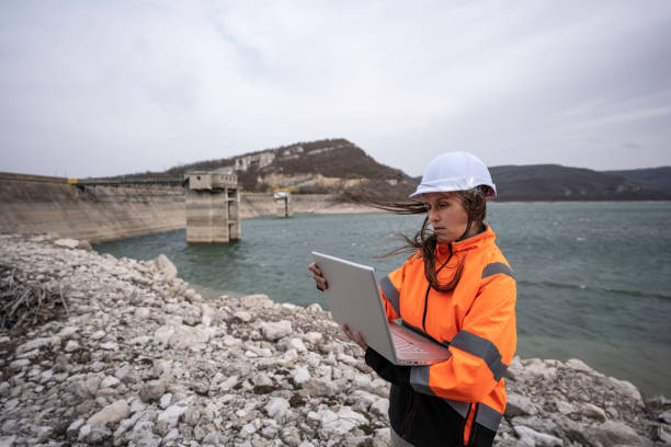 istock Female engineer working in hydroelectric dam. 1481512751