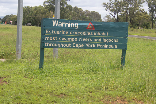 Warning sign –  Information sign, Crocodiles inhabit throughout Cape York Peninsula Australia