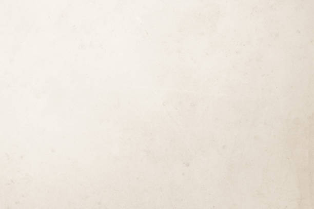 istock Colour old concrete wall texture background. Close Up retro plain cream color cement wall background texture. Design paper vintage parchment element show or advertise or promote product on display. 1481512950