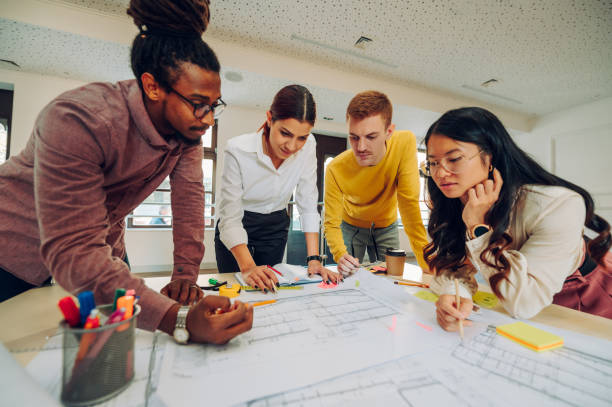 istock Multiracial team of engineers or architects having a meeting in an office 1481513022