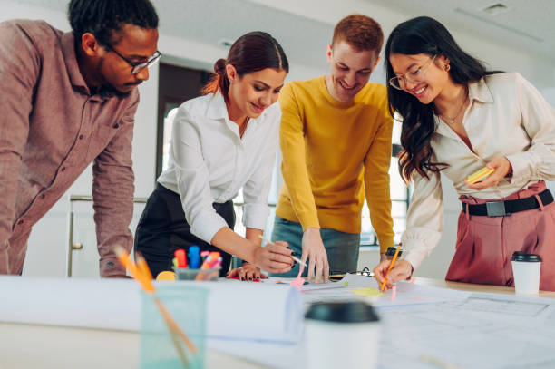 istock Diverse group of engineers or architects having a meeting in an office 1481513026