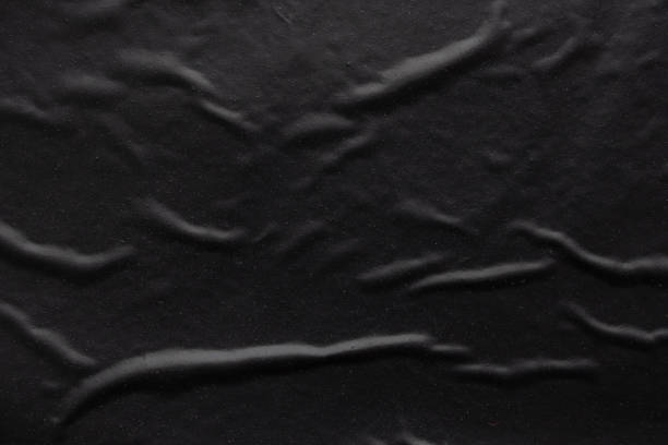 istock black crumpled and creased plastic poster texture background 1481513104