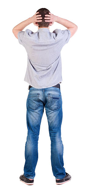 istock Back view of shocked  man in shir 148151946