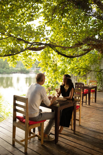 istock Couple in restaurant by the lake 1481520017