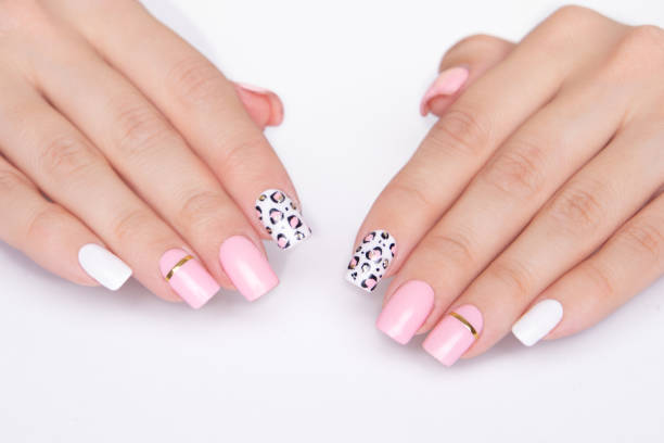 istock Female hands with pink manicure nails 1481522783