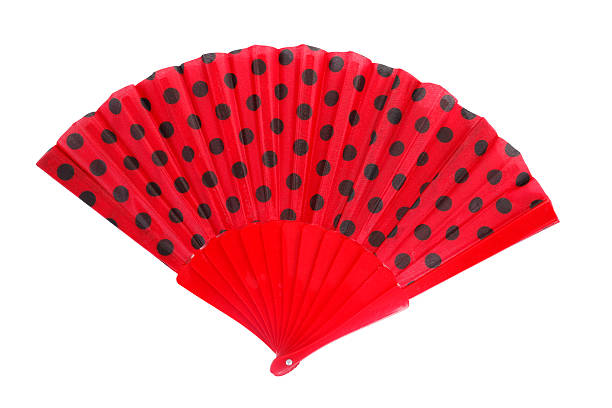 istock Hand fan red with black spots 148152780