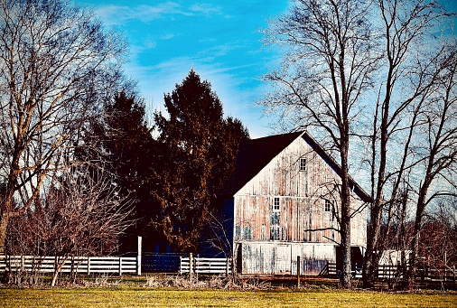 A well constructed vintage barn in need of a fresh coat of paint