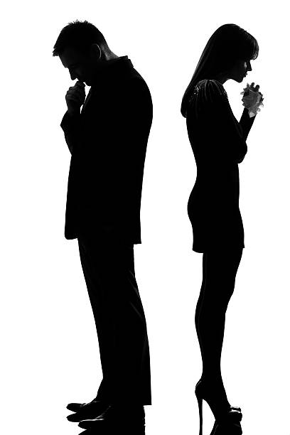 istock one sad couple man thinking and woman crying 148154718