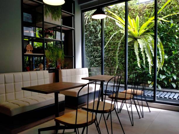 istock Table seats and large windows in the cafe 1481553671