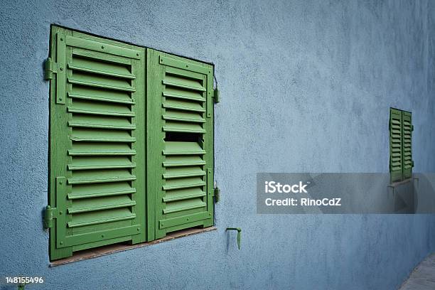 Blue Wall With Green Windows Perspective Stock Photo - Download Image Now - Blue, Building Exterior, Built Structure