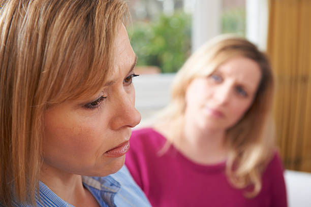 istock Unhappy woman in conversation with friend 148157716
