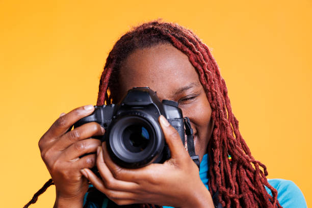istock Female photographer taking pictures 1481578154
