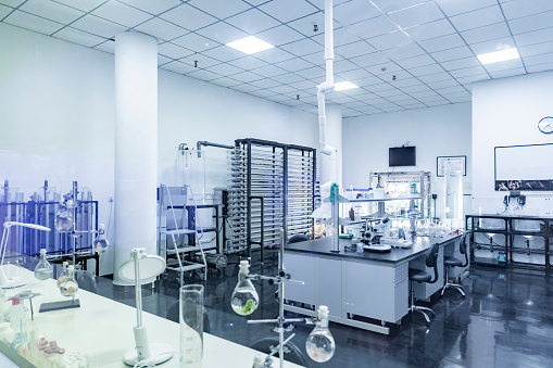 An empty laboratory filled with glass instruments