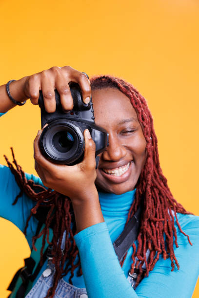 istock Female person taking photos with camera 1481578170