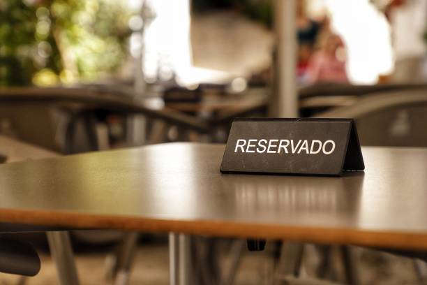 istock sign on bar table indicating that it is reserved 1481578327