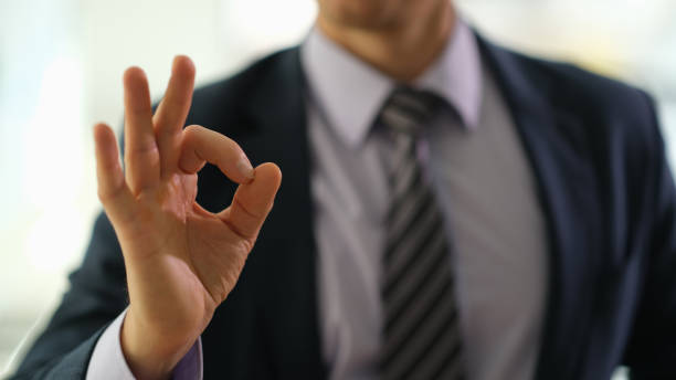 istock Businessman manager showing ok gesture in office closeup 1481581453