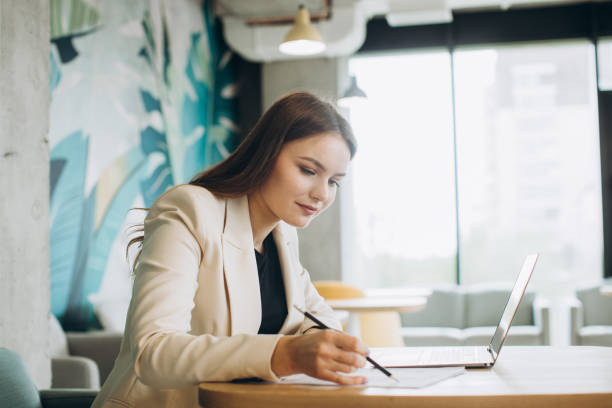 istock Businesswoman using laptop in office 1481584279