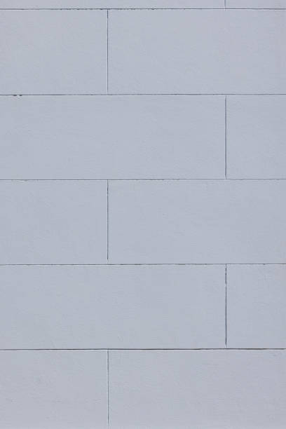 istock Part of a painted light blue concrete block wall 1481595030