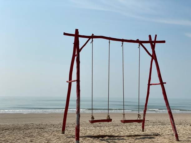 istock Swings by the sea. 1481599495