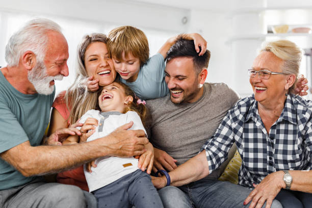 istock Playful multi-generation family having fun at home. 1481600389