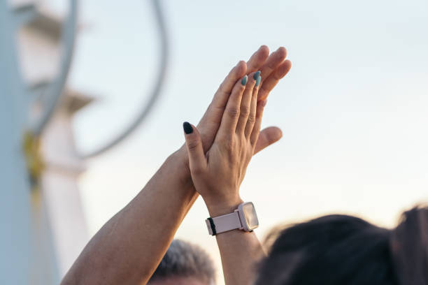 istock Close-up of a high-five at sunset time.. 1481606560