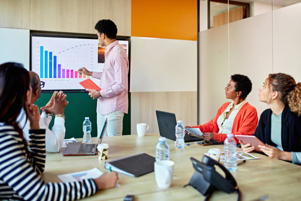 istock Multiracial businessman presenting data at meeting 1481606638