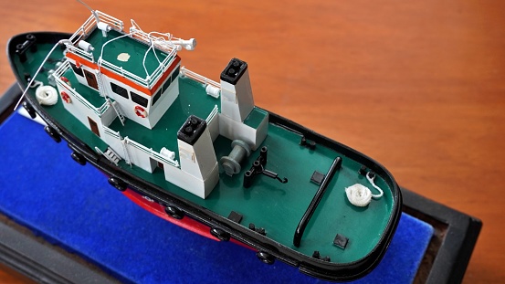 Close up room decoration or as a miniature motor vessel toy boat ship gift. Selective focus