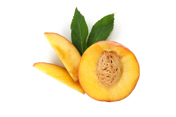 istock Half of peach fruit and slices isolated on white background 1481608459