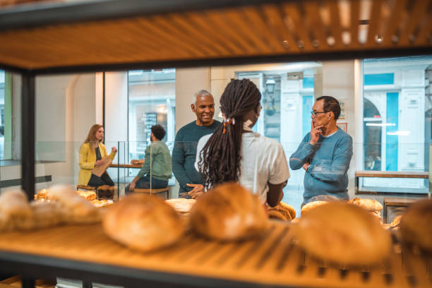 istock Multiracial Customers Buying In Baked Goods Small Artisan Bakery 1481608597
