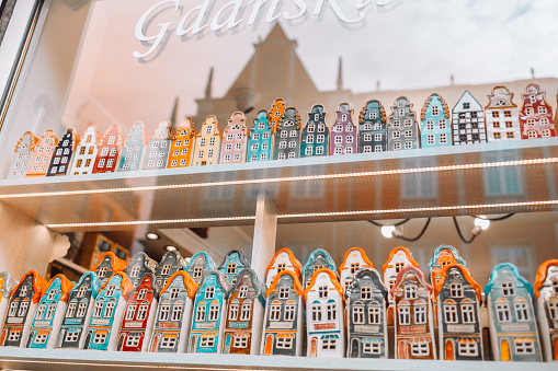 Delicious traditional Liege waffles with colorful toppings on display in a store window in Brussels, Belgium. Sugary desserts. Typical Belgian sweet food.