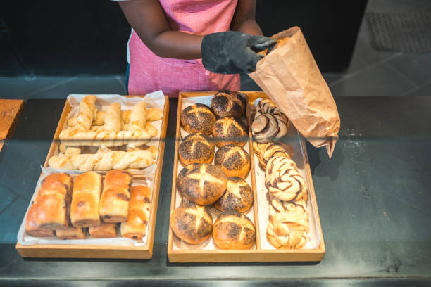 istock Lovely Black Female Preparing Order In An Artisan Bakery 1481611000