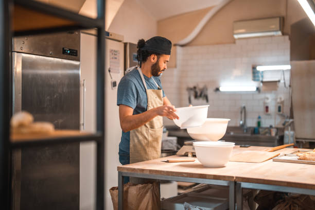 istock Middle Eastern Baker Weighting Out Flour In A Small Bakery 1481611014