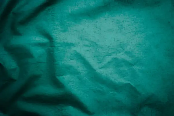 Photo of The close-up shows the image and reflective view of the silver-green nano fabric.